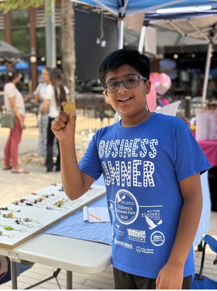 Selling keychains at the Acton Business Fair